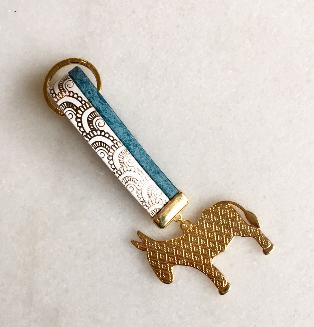 Porte clé Âne blanc doré