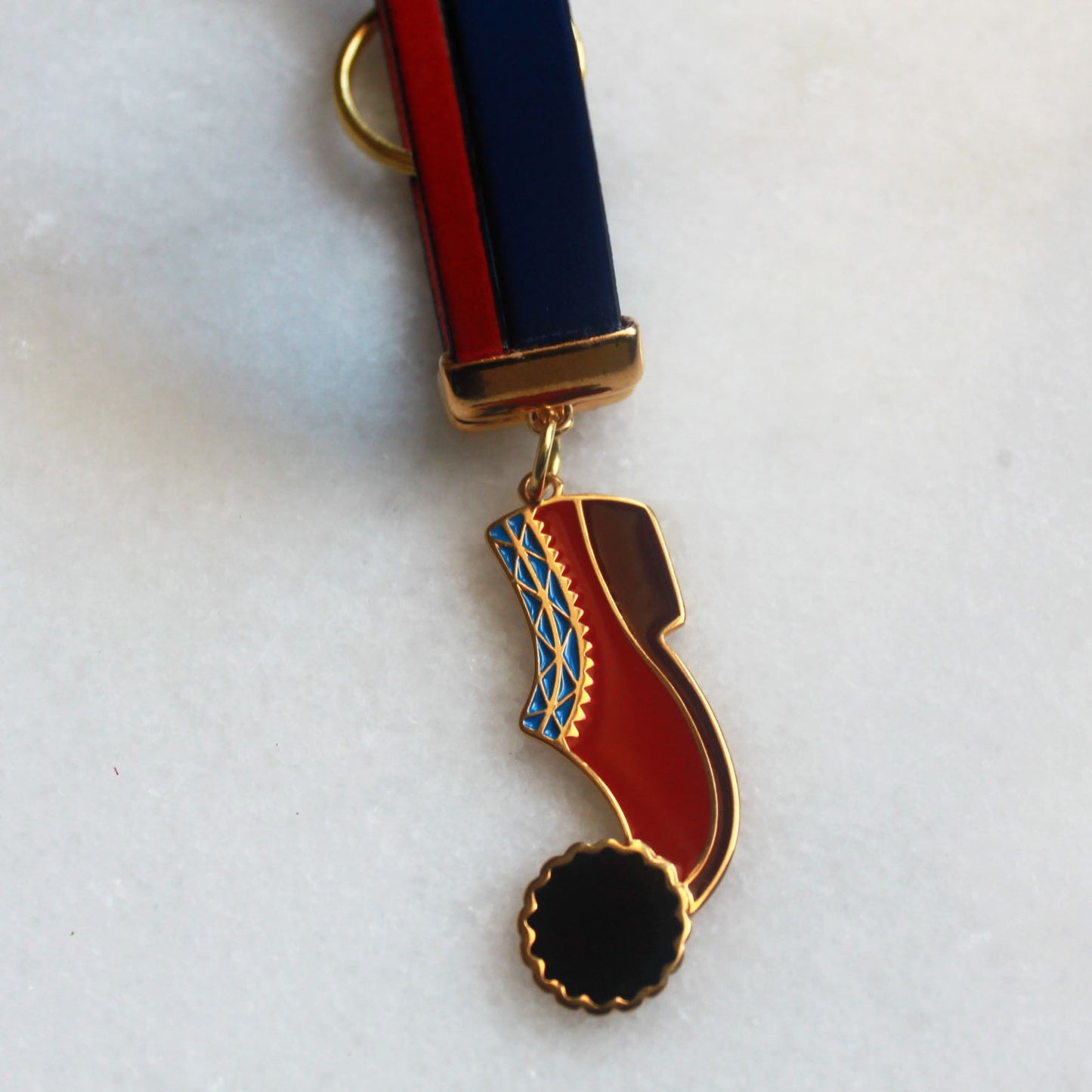 Porte clé dorée PAPOUTSIA