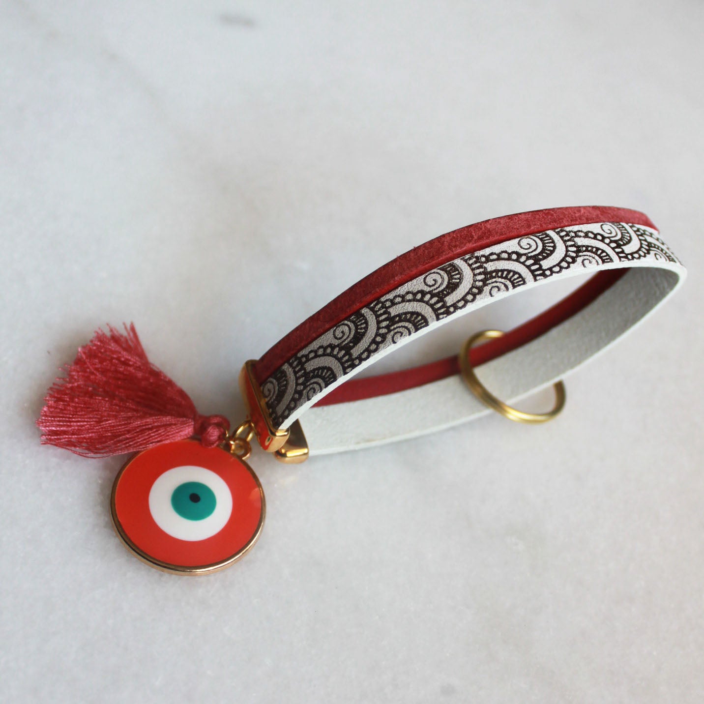 Porte clé œil grec corail
