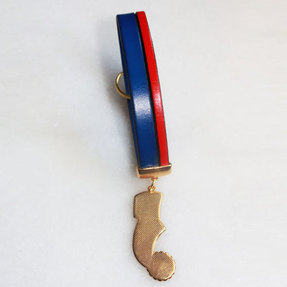 Porte clé dorée PAPOUTSIA